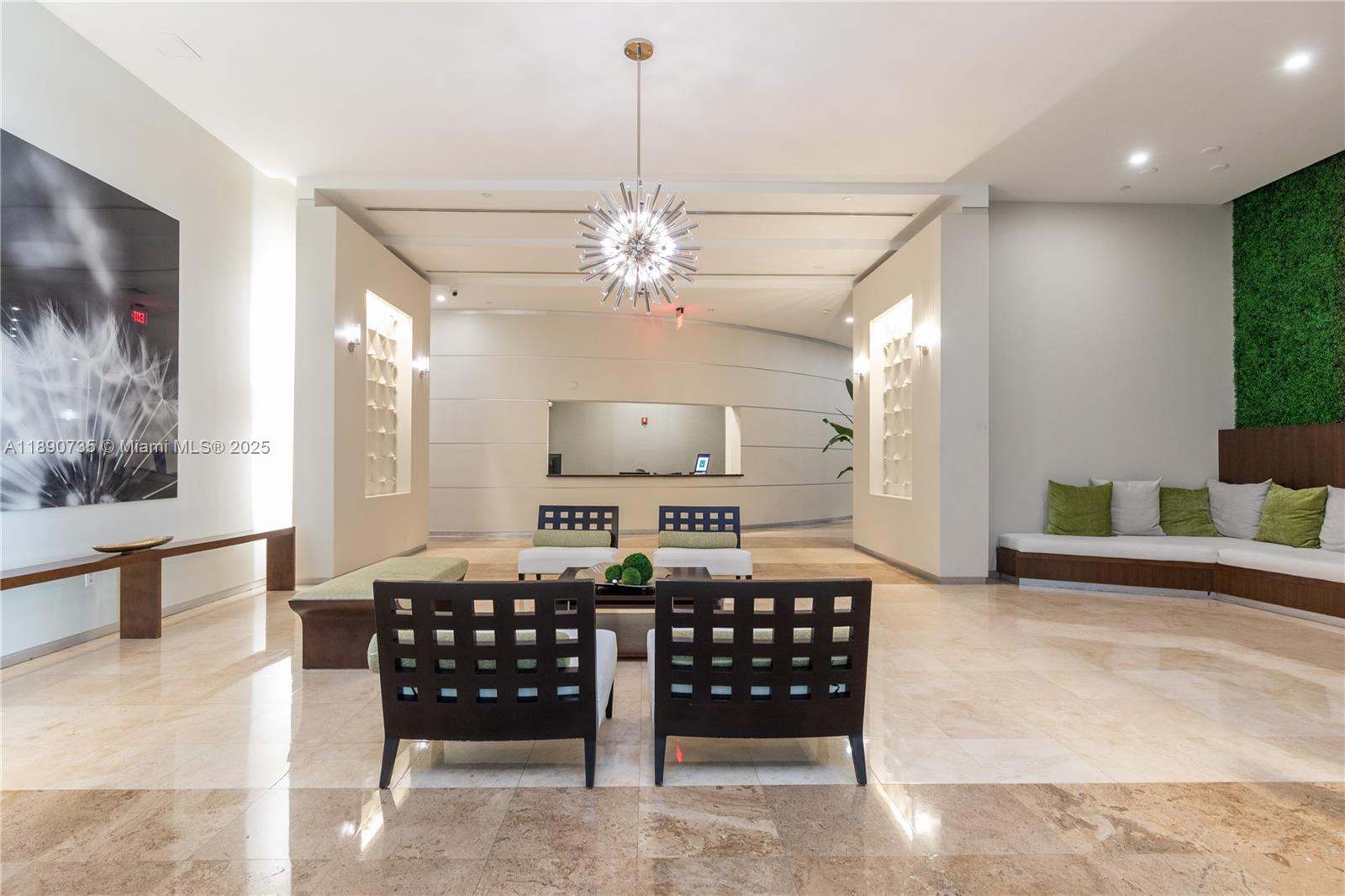 9055 Southwest 73rd Court, Unit 1603 Miami, FL 33156 - Photo 20 of 28 a living room with furniture and a chandelier