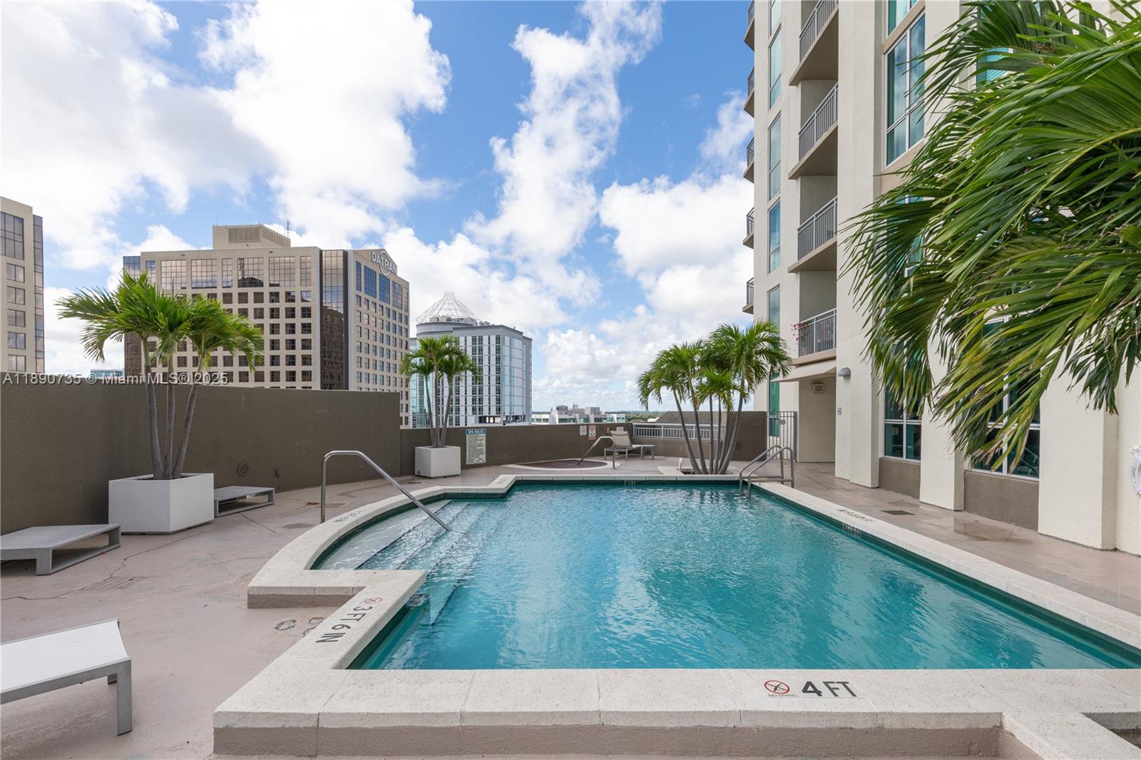 9055 Southwest 73rd Court, Unit 1603 Miami, FL 33156 - Photo 24 of 28 a view of a patio with couches table and chairs and potted plants