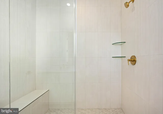 a view of a hallway with staircase