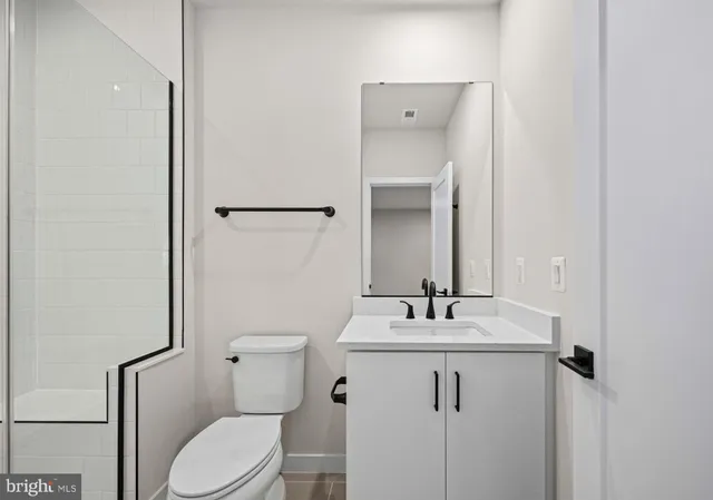 a house with a tree in front of it