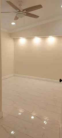 a view of a room with an empty space