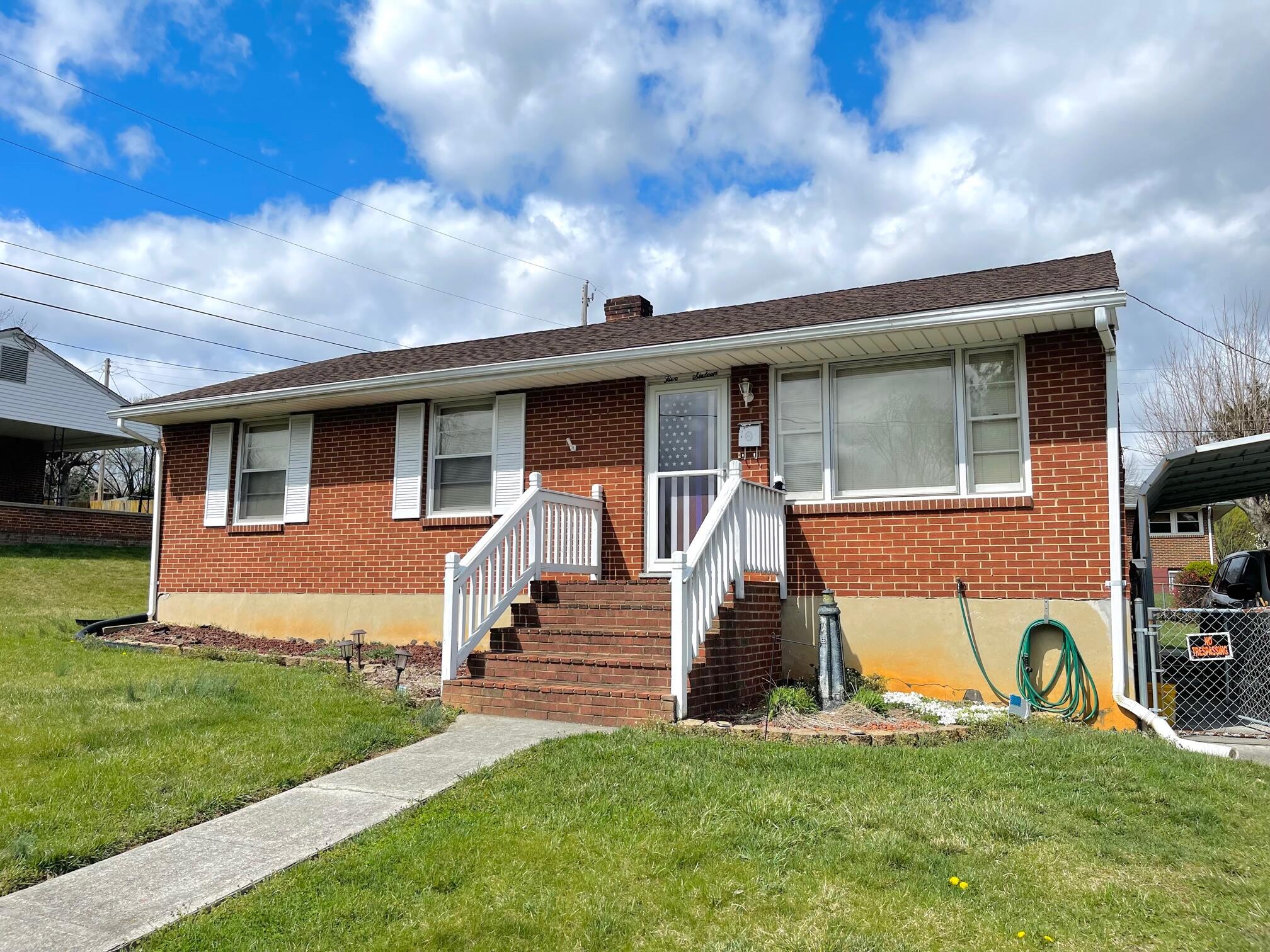 516 Mapleton Avenue Northeast Roanoke, VA 24012 - Photo 1 of 21 a view of a house with a yard