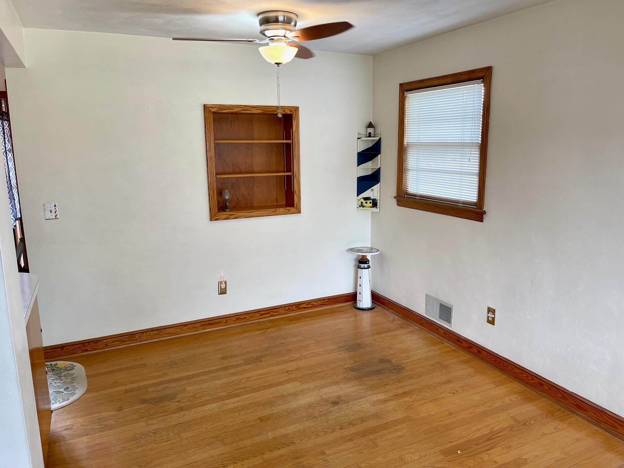 516 Mapleton Avenue Northeast Roanoke, VA 24012 - Photo 13 of 21 a view of an empty room with a window