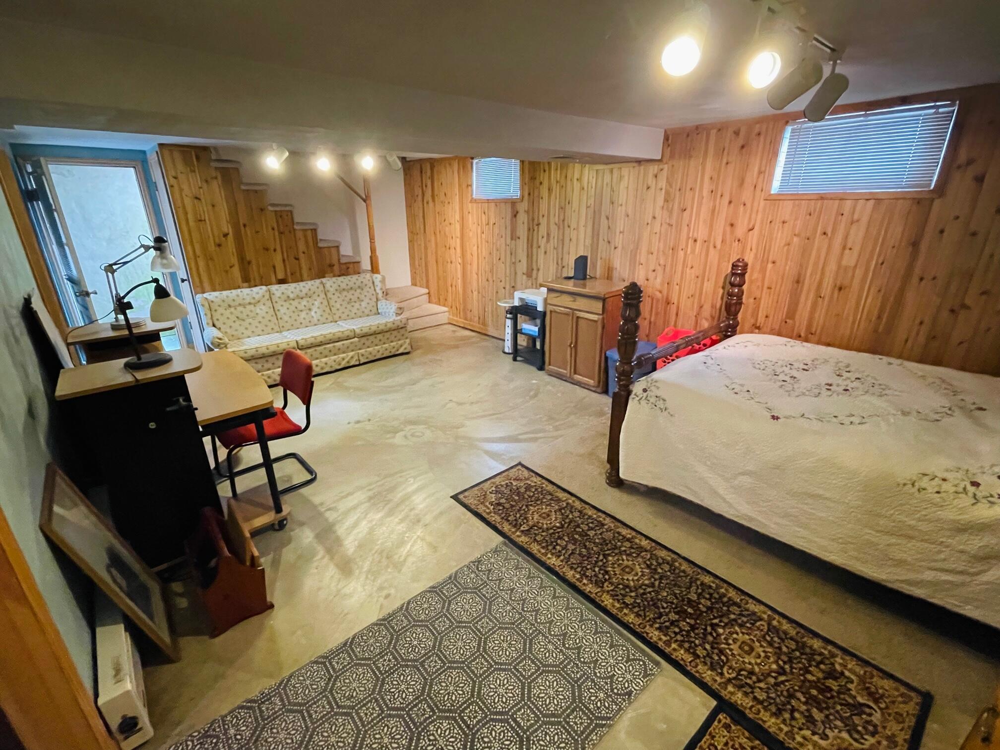 516 Mapleton Avenue Northeast Roanoke, VA 24012 - Photo 19 of 21 a bed room with a bed window and a mirror