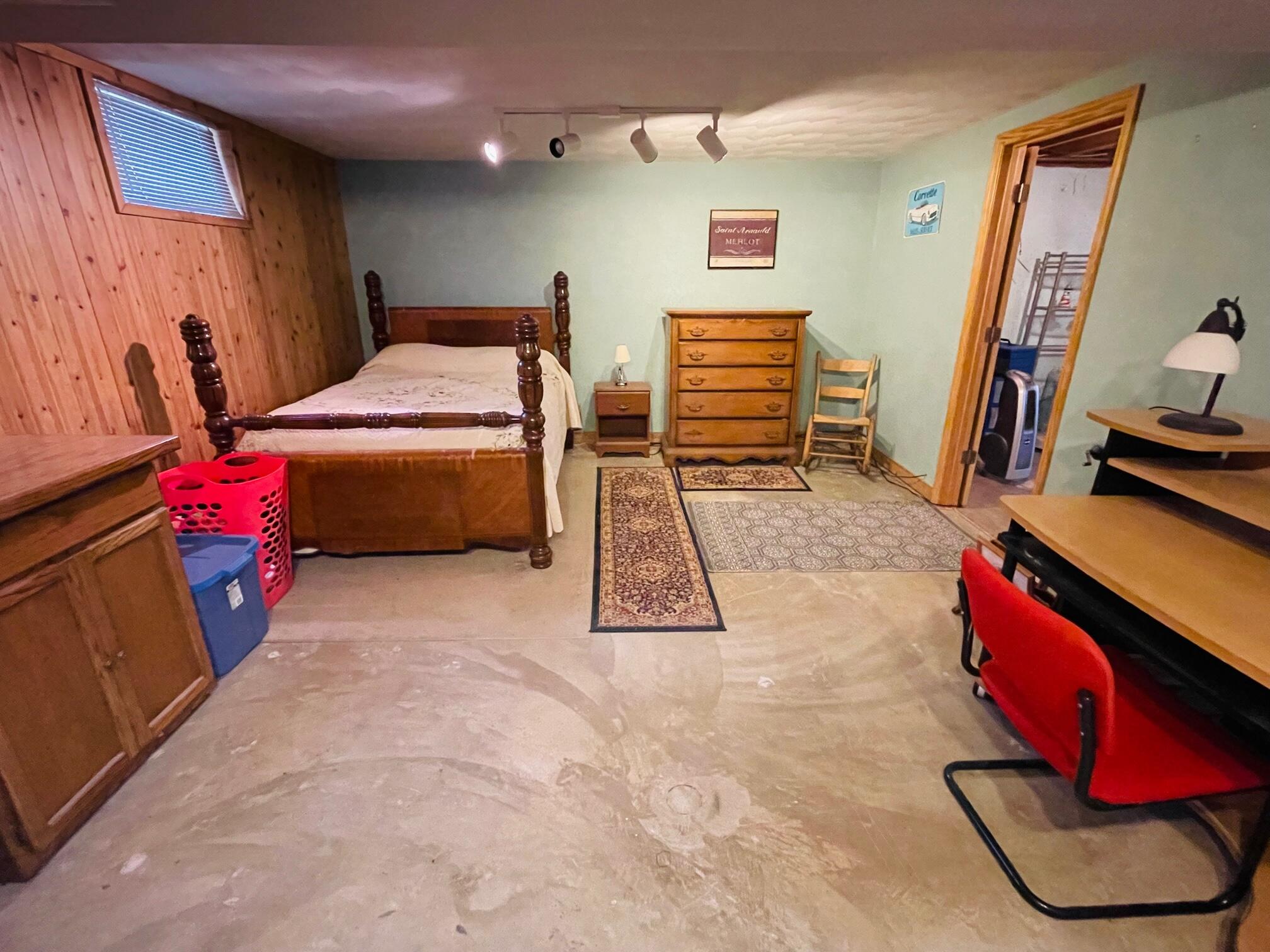 516 Mapleton Avenue Northeast Roanoke, VA 24012 - Photo 21 of 21 a bedroom with furniture and a flat screen tv