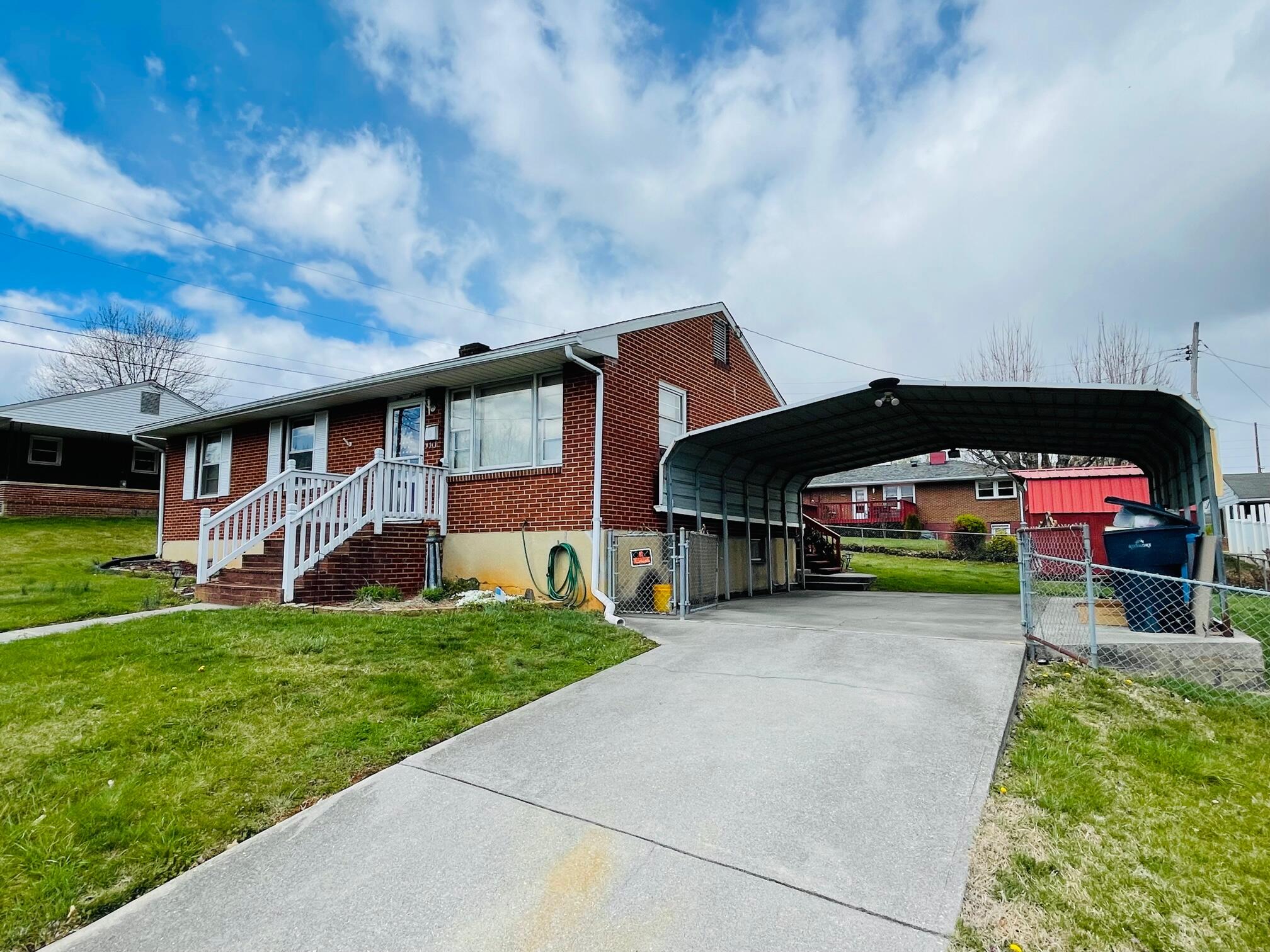 516 Mapleton Avenue Northeast Roanoke, VA 24012 - Photo 5 of 21 a view of a house with a back yard