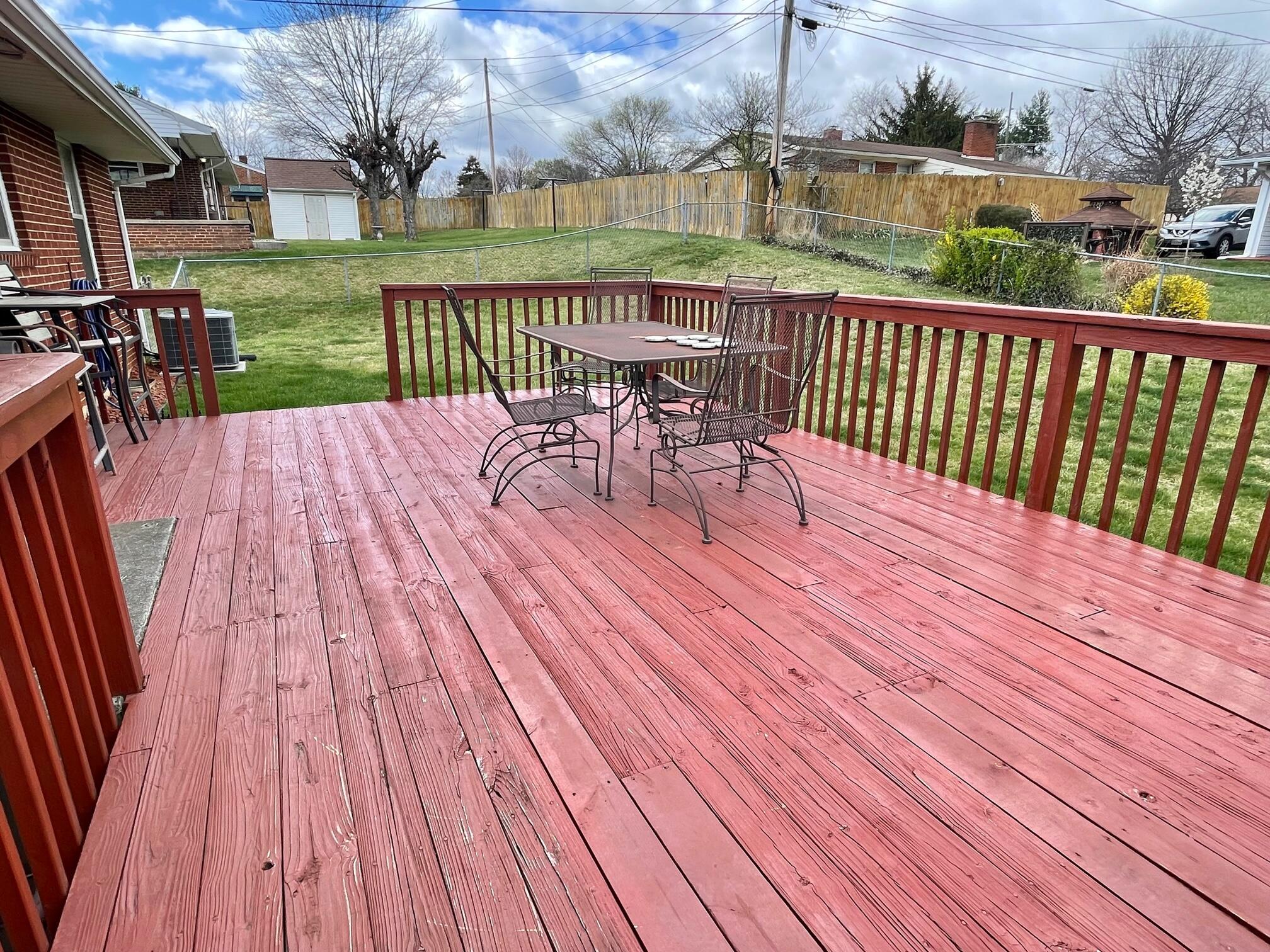516 Mapleton Avenue Northeast Roanoke, VA 24012 - Photo 6 of 21 a view of a wooden deck and outdoor seating