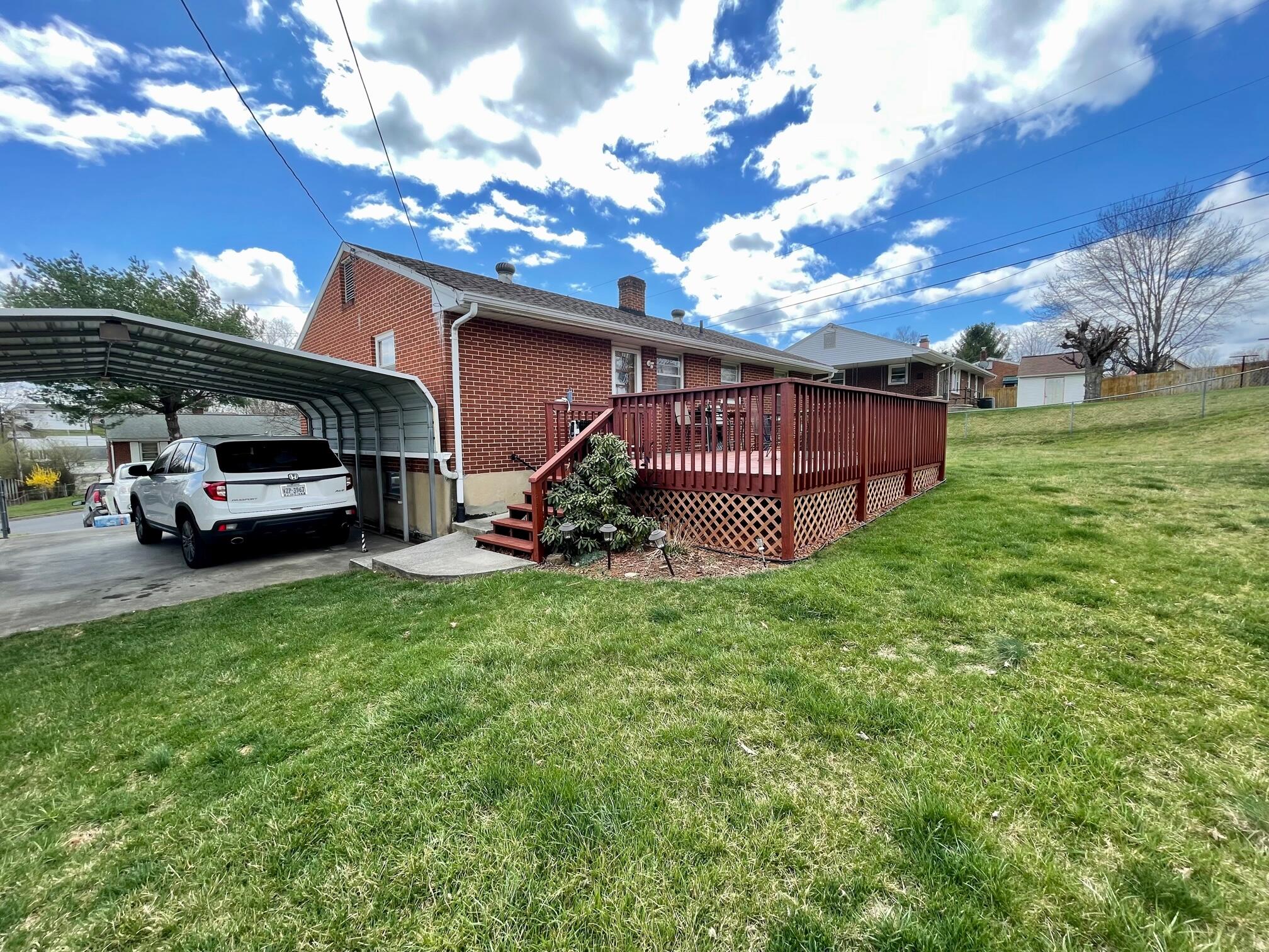 516 Mapleton Avenue Northeast Roanoke, VA 24012 - Photo 8 of 21 a view of a car park in front of house