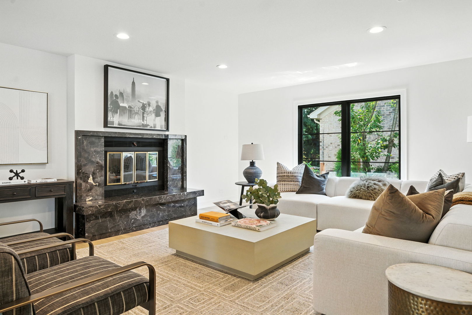 5603 South Garfield Street Hinsdale, IL 60521 - Photo 11 of 67 a living room with furniture a large window and a fireplace