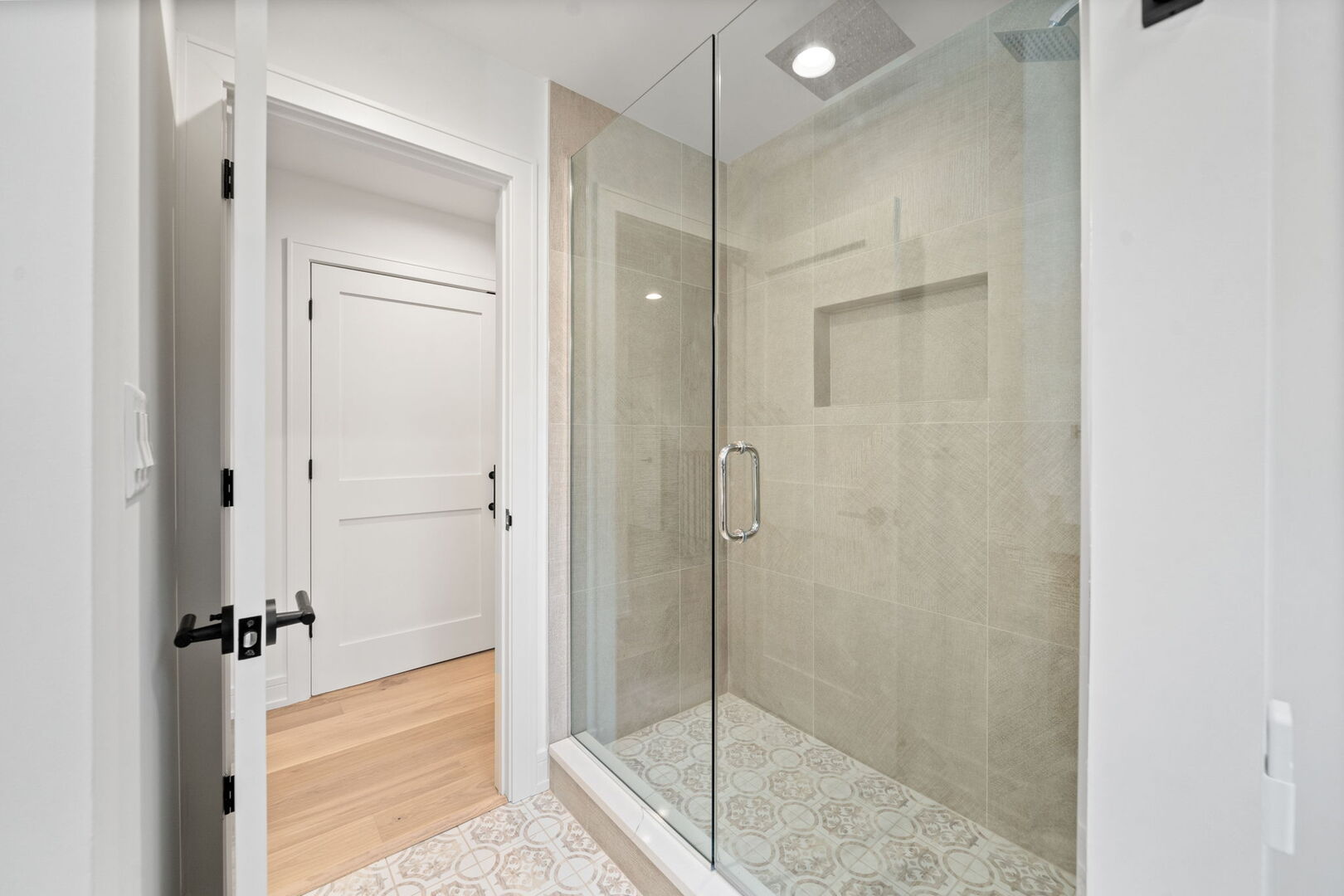 5603 South Garfield Street Hinsdale, IL 60521 - Photo 42 of 67 a bathroom with a glass shower door