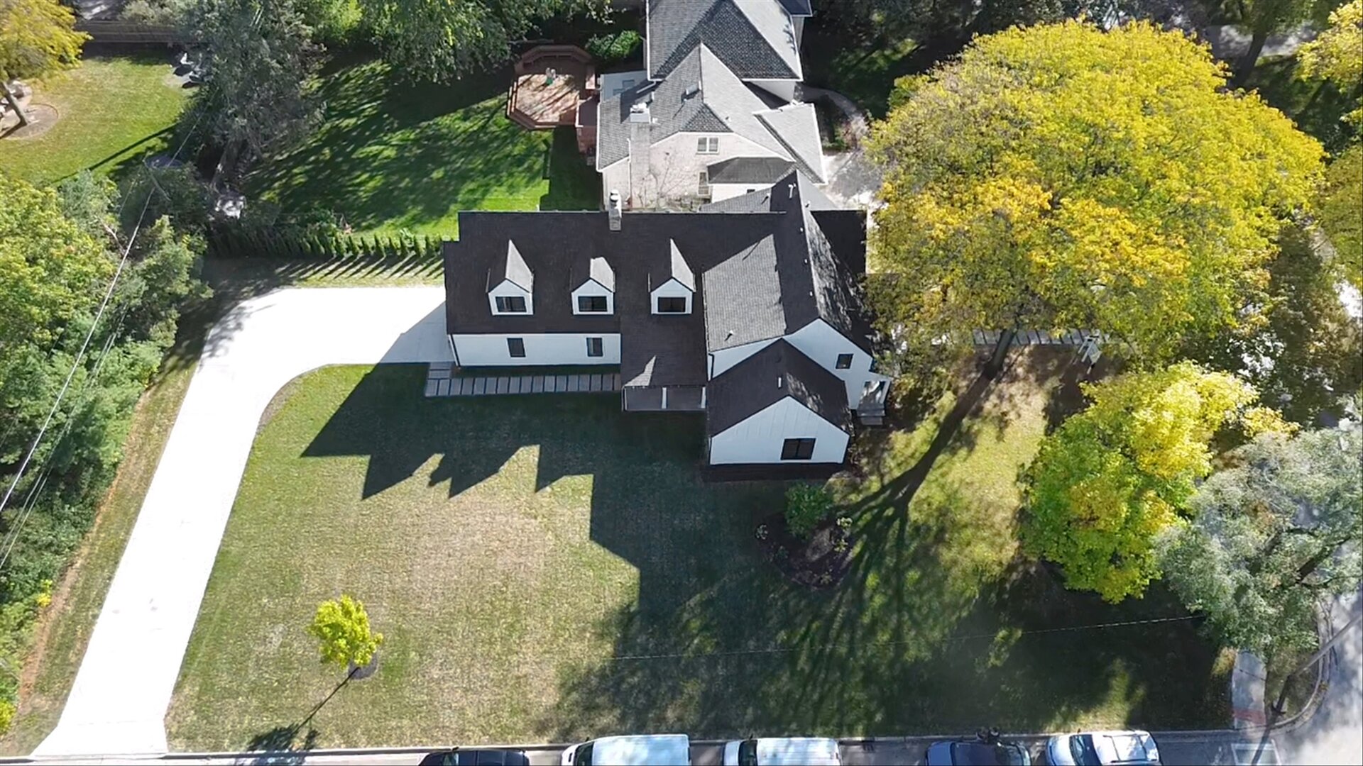 5603 South Garfield Street Hinsdale, IL 60521 - Photo 64 of 67 an aerial view of a house with swimming pool a yard and mountain view