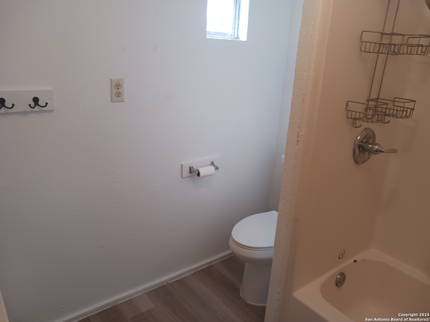 23717 Wood Park, Unit 3 San Antonio, TX 78264 - Photo 10 of 18 a bathroom with a granite countertop toilet and a sink