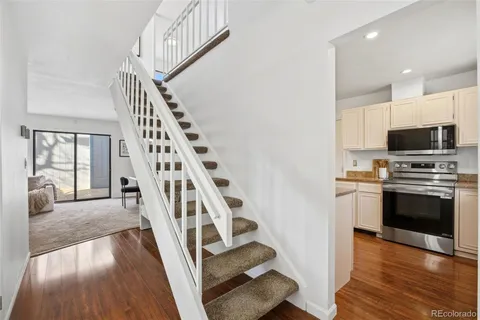 a view of kitchen with microwave and stove