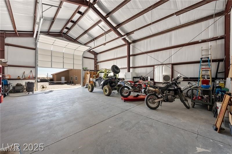 760 Fort Churchill Road Pahrump, NV 89060 - Photo 23 of 33 Garage featuring metal wall