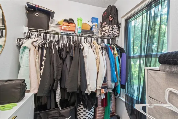 an aerial view of residential house with outdoor space and swimming pool