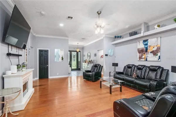 a kitchen with a sink cabinets and appliances