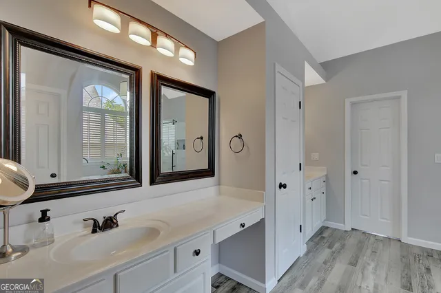 a view of a park with swings and slides