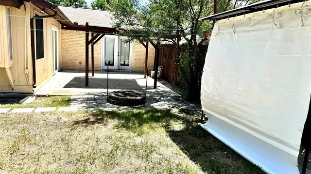 a view of house with yard