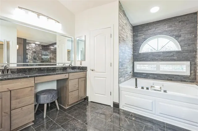 a view of a bathroom with shower