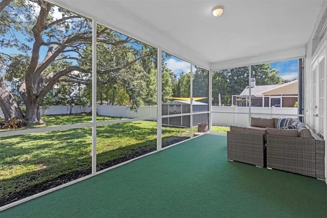 a view of a yard with swimming pool