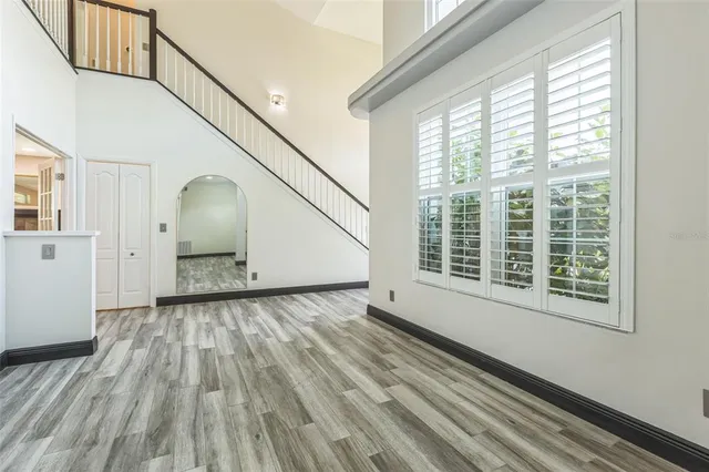 a view of entryway with wooden floor