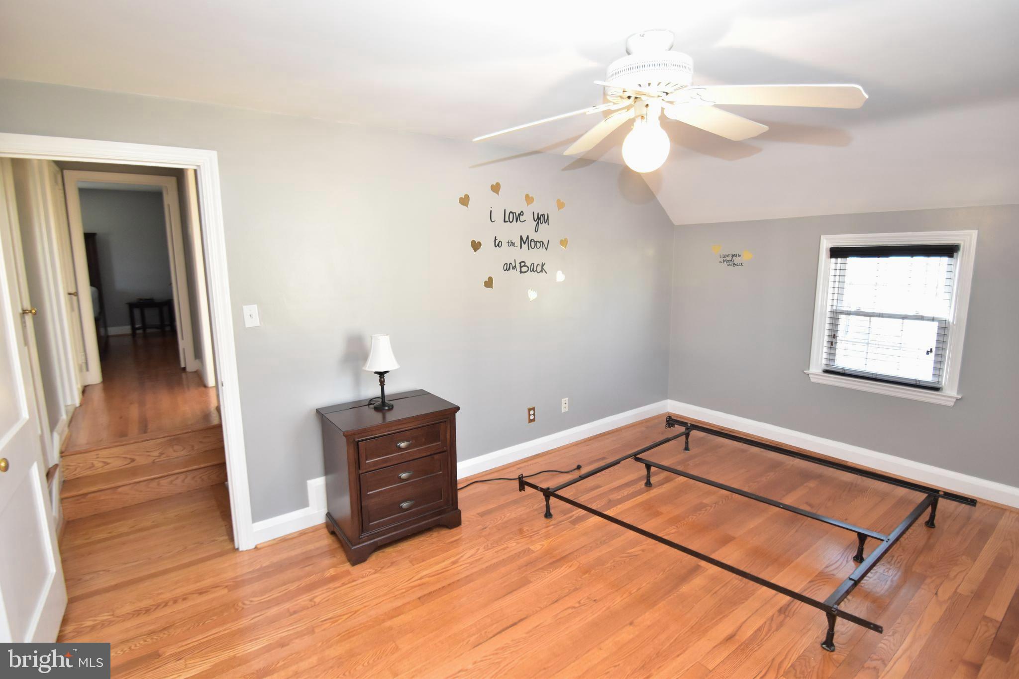 22 Tanglewood Road Baltimore, MD 21228 - Photo 17 of 25 Bedroom # 3 with shiny hardwood floors & fan