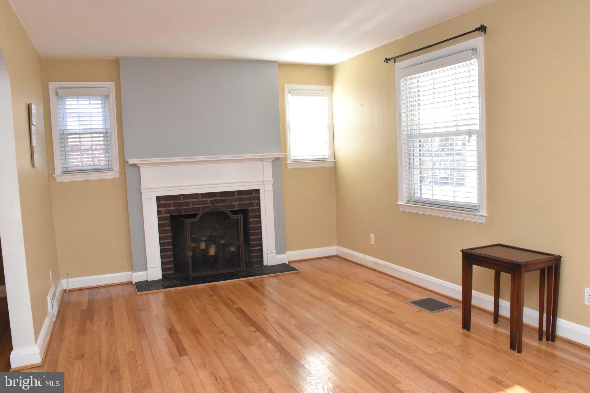 22 Tanglewood Road Baltimore, MD 21228 - Photo 6 of 25 Woodburning FP accents this lovely space