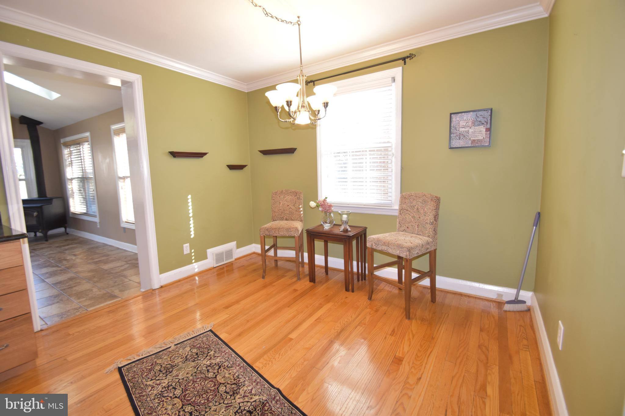 22 Tanglewood Road Baltimore, MD 21228 - Photo 7 of 25 Dining Area off kitchen features HW