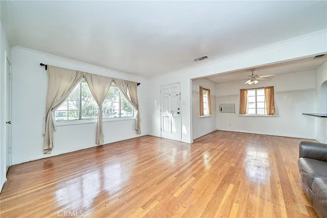 a view of an empty room and window
