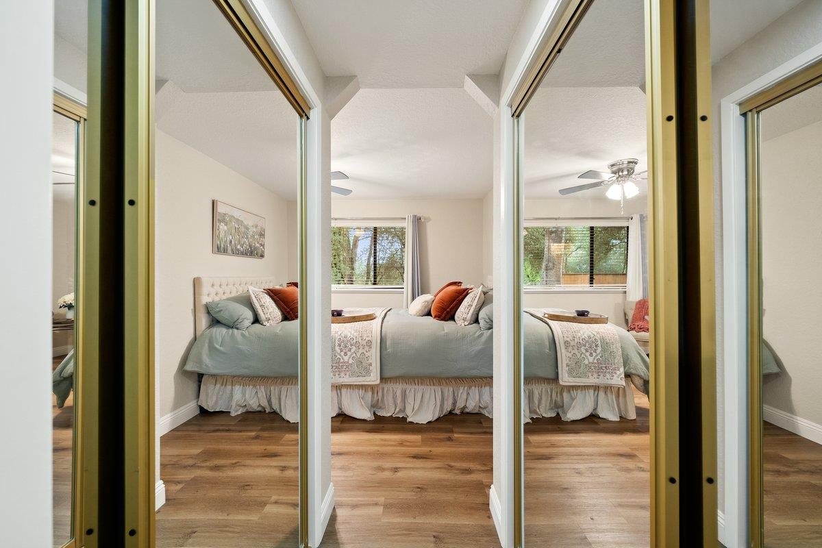 6561 Trinity Way Placerville, CA 95667 - Photo 21 of 58 a bedroom with bed and glass door