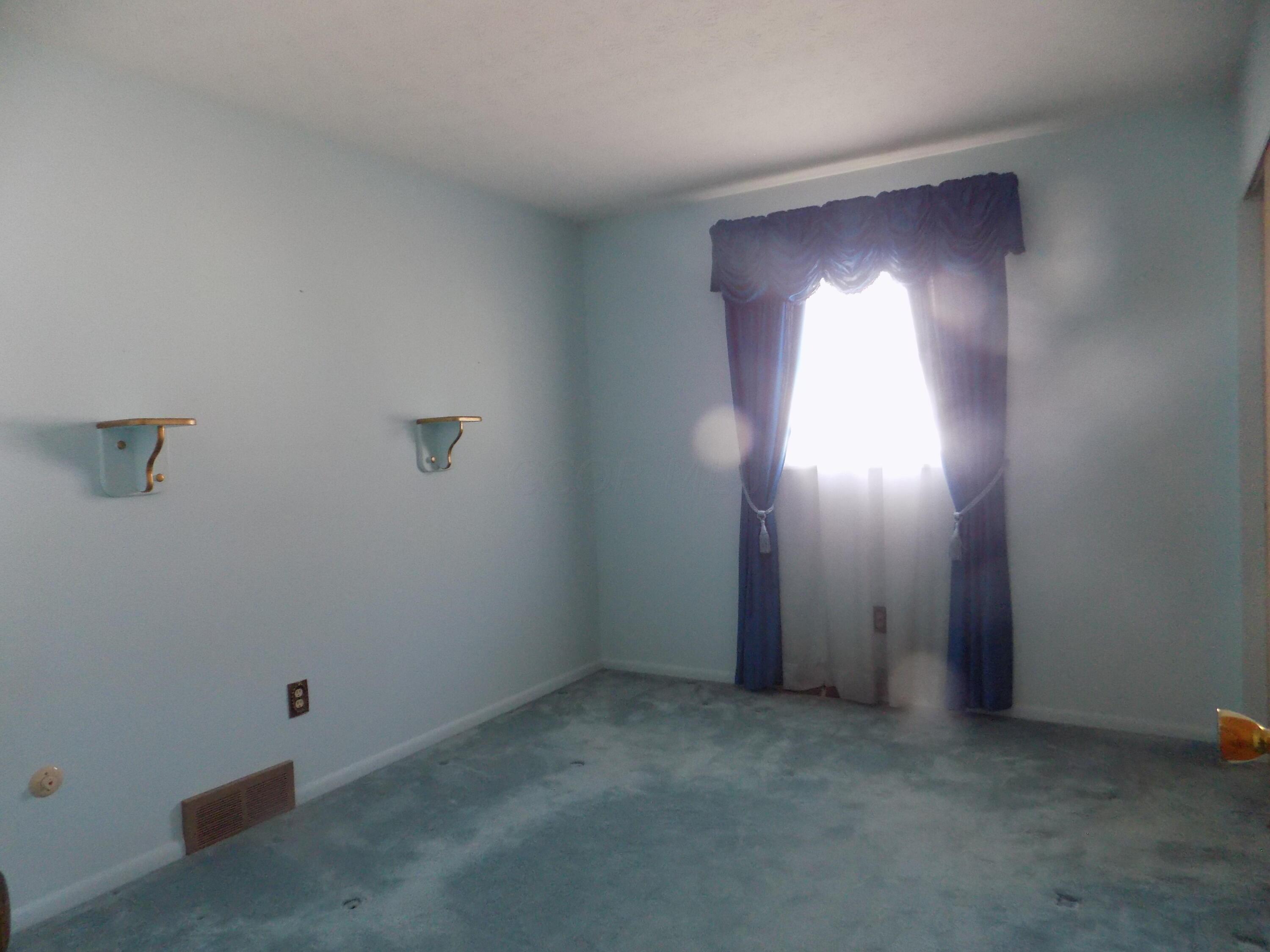 2100 Sale Road Columbus, OH 43224 - Photo 14 of 24 Good quality carpeting with hardwood floors underneath.