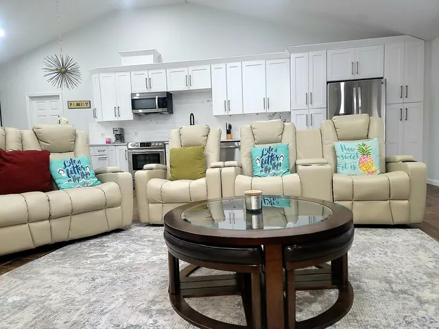 a living room with furniture and a couch