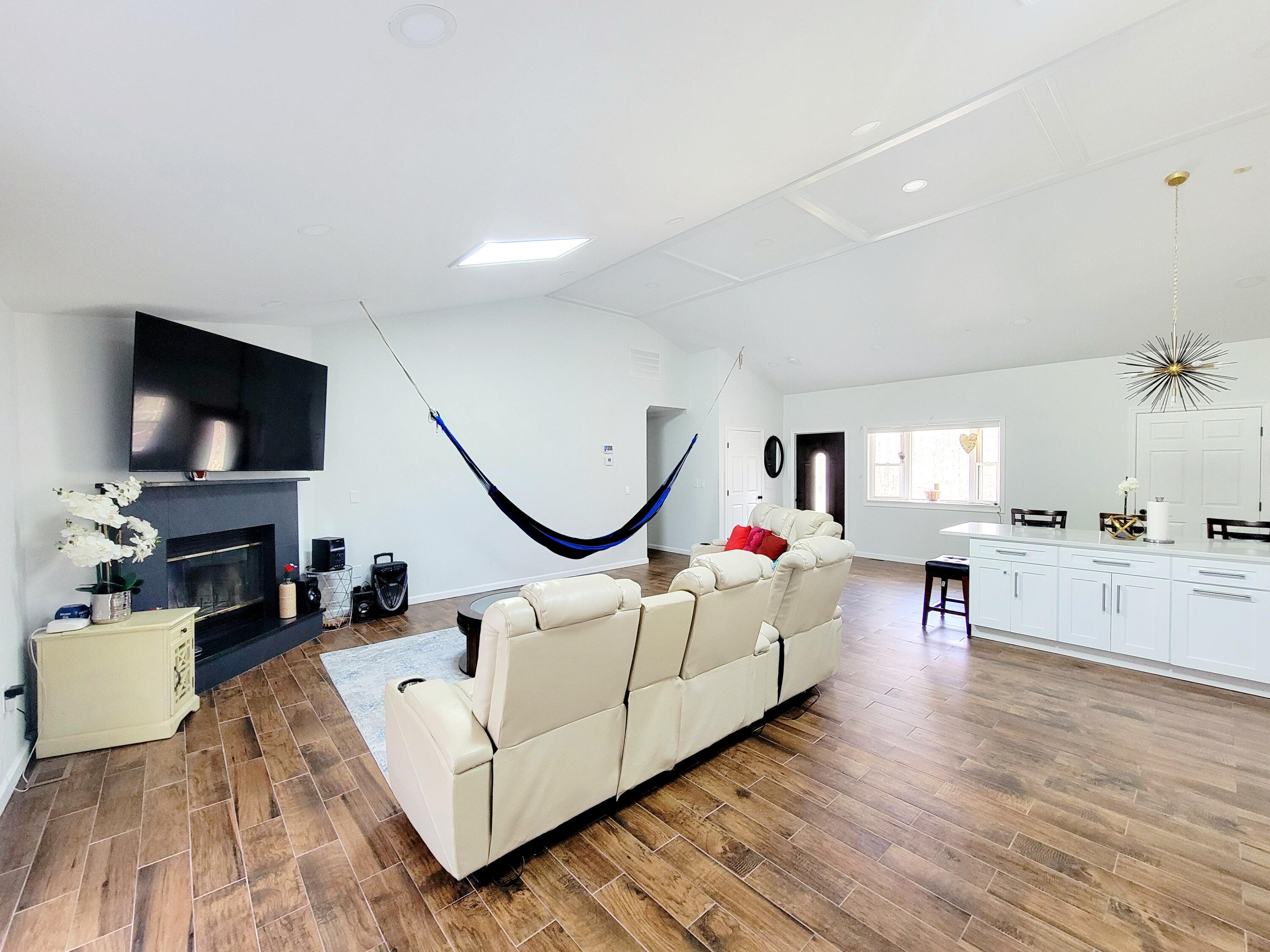 6395 Cherokee Trail Tobyhanna, PA 18466 - Photo 17 of 48 a living room with furniture and a flat screen tv