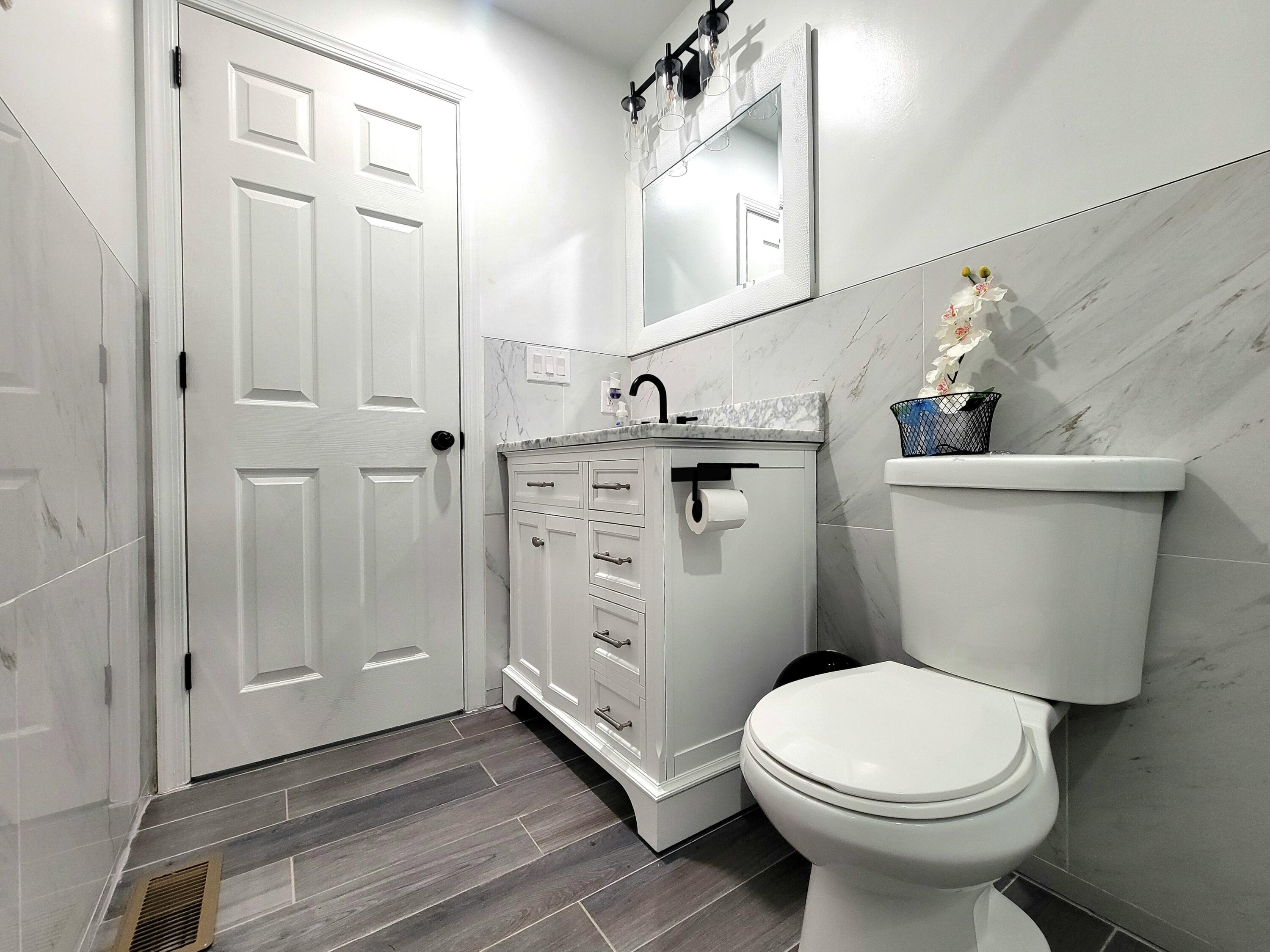 6395 Cherokee Trail Tobyhanna, PA 18466 - Photo 20 of 48 a bathroom with a sink a toilet and shower
