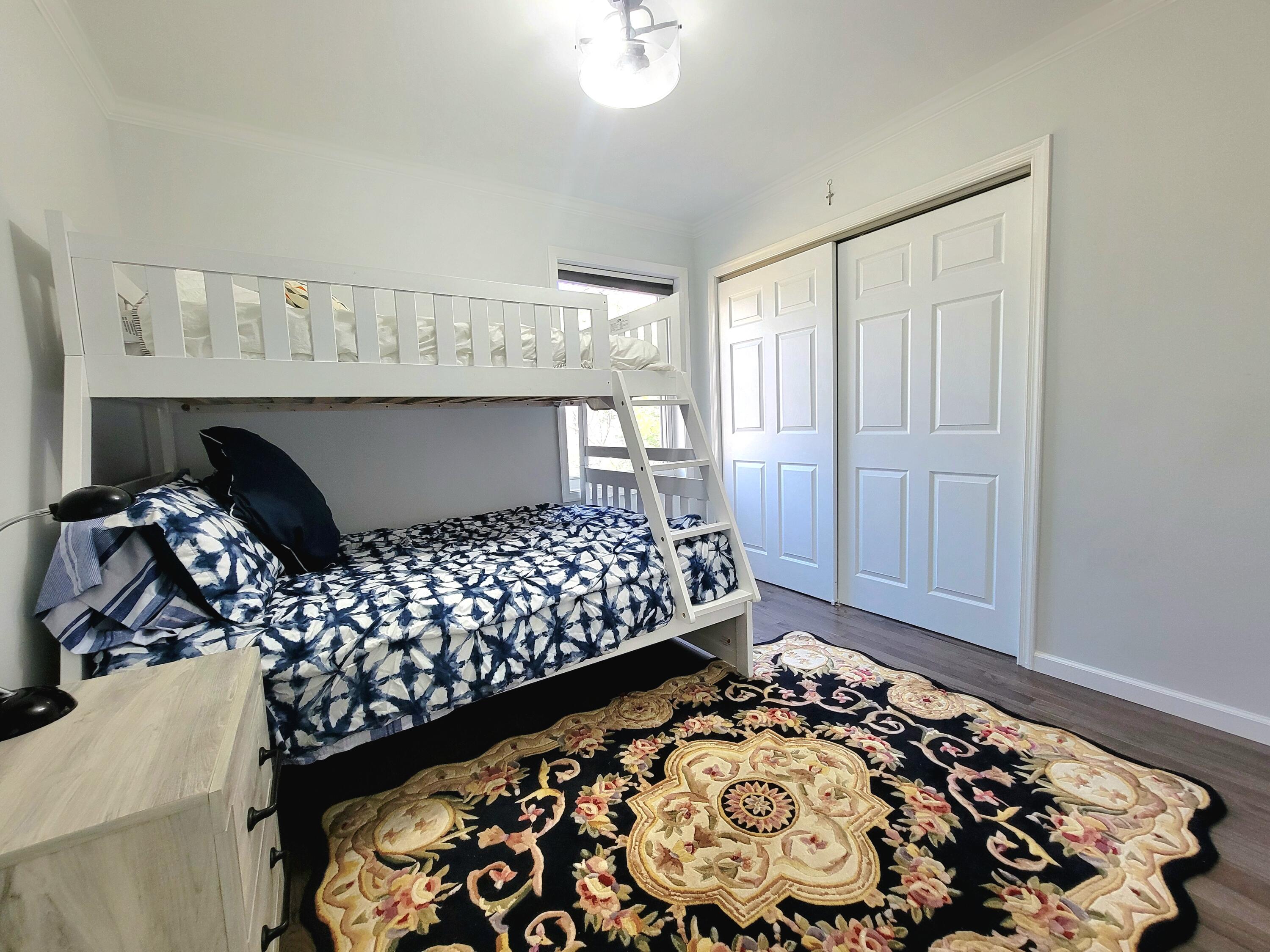 6395 Cherokee Trail Tobyhanna, PA 18466 - Photo 26 of 48 a bed sitting in a bedroom next to a window