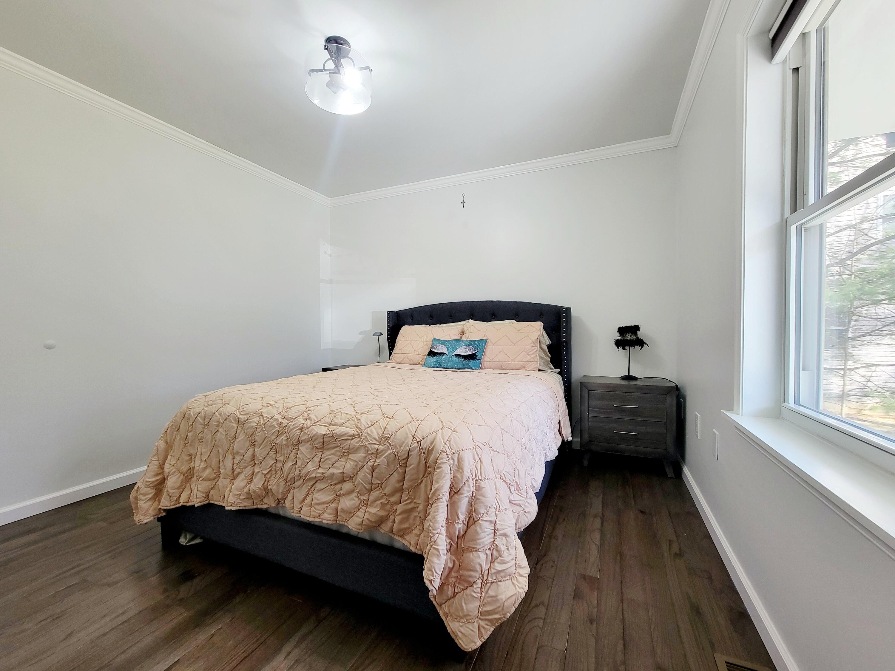 6395 Cherokee Trail Tobyhanna, PA 18466 - Photo 28 of 48 a bedroom with a bed and wooden floor
