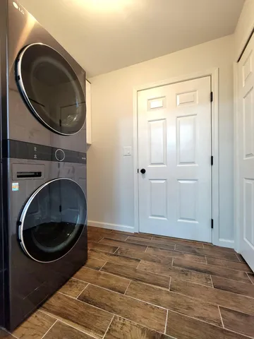 a view of swimming pool with a patio