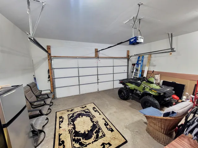 a view of backyard with deck and seating area