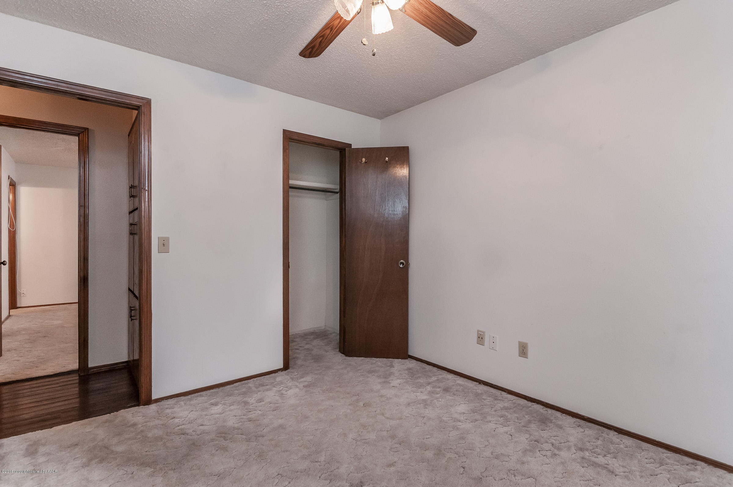 5312 Wheeler Lane Amarillo, TX 79110 - Photo 17 of 20 an empty room with closet area