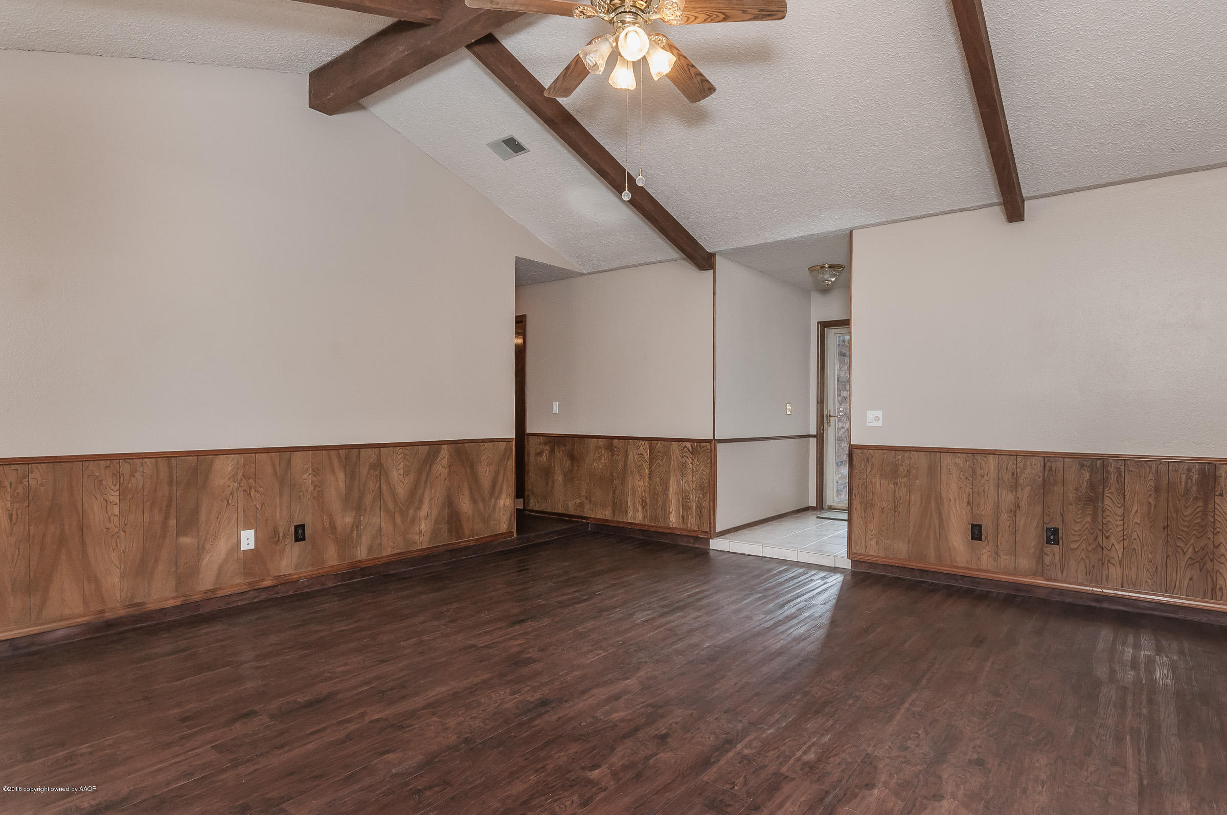5312 Wheeler Lane Amarillo, TX 79110 - Photo 4 of 20 a view of an empty room with wooden floor