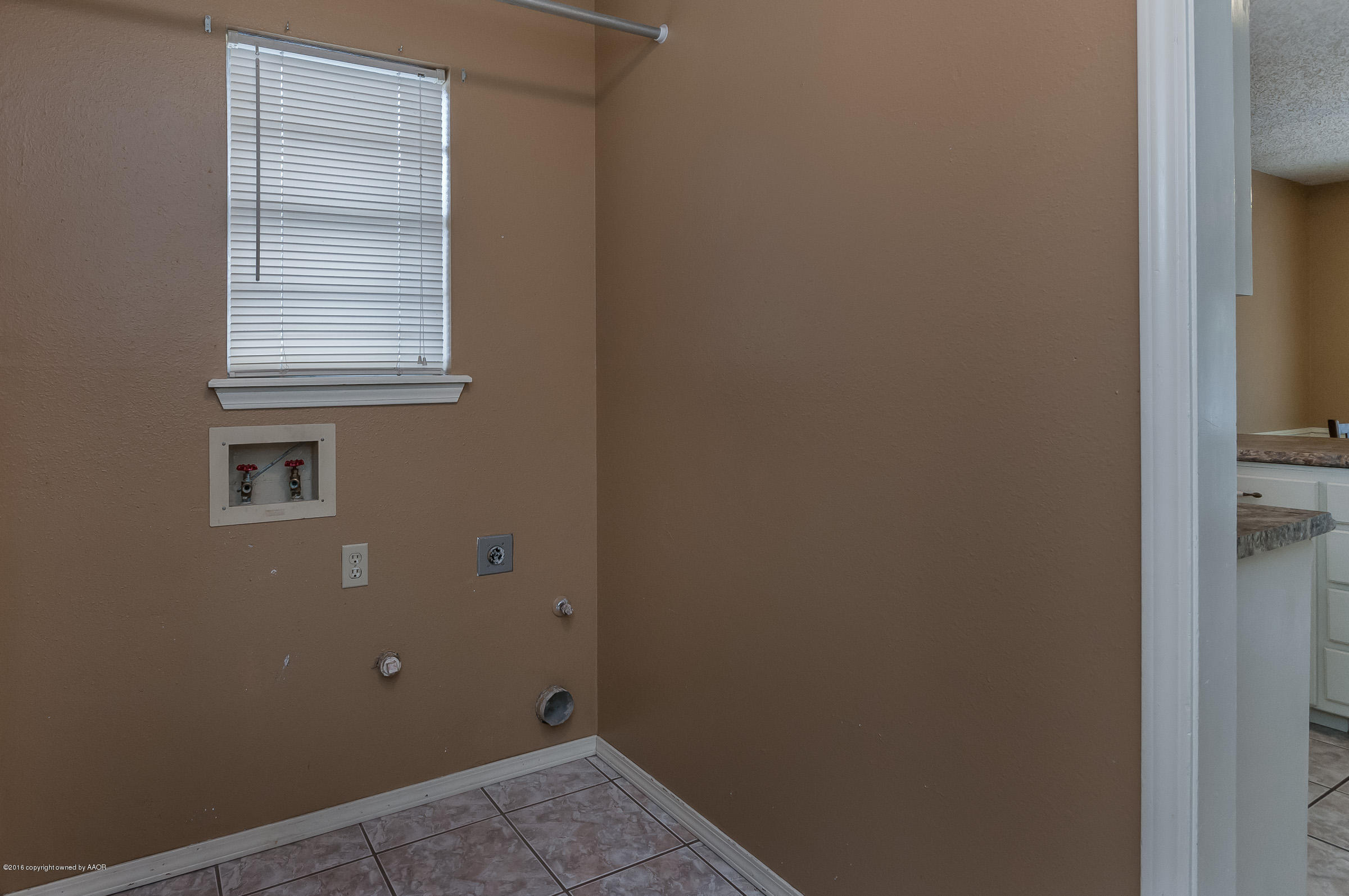 5312 Wheeler Lane Amarillo, TX 79110 - Photo 10 of 20 a view of a room that has a window in it