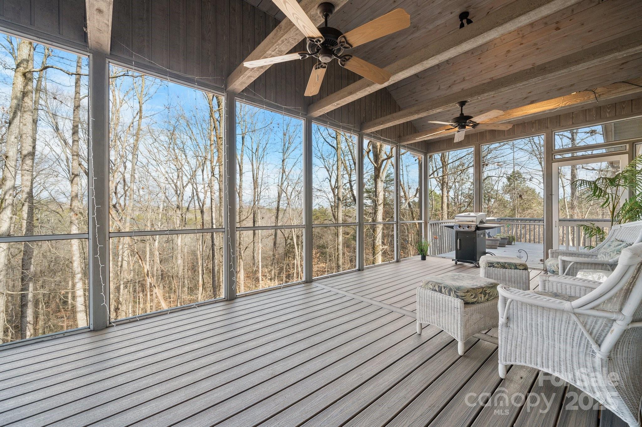 4530 Meandering Way Conover, NC 28613 - Photo 36 of 48 a view of a balcony with furniture and wooden floor