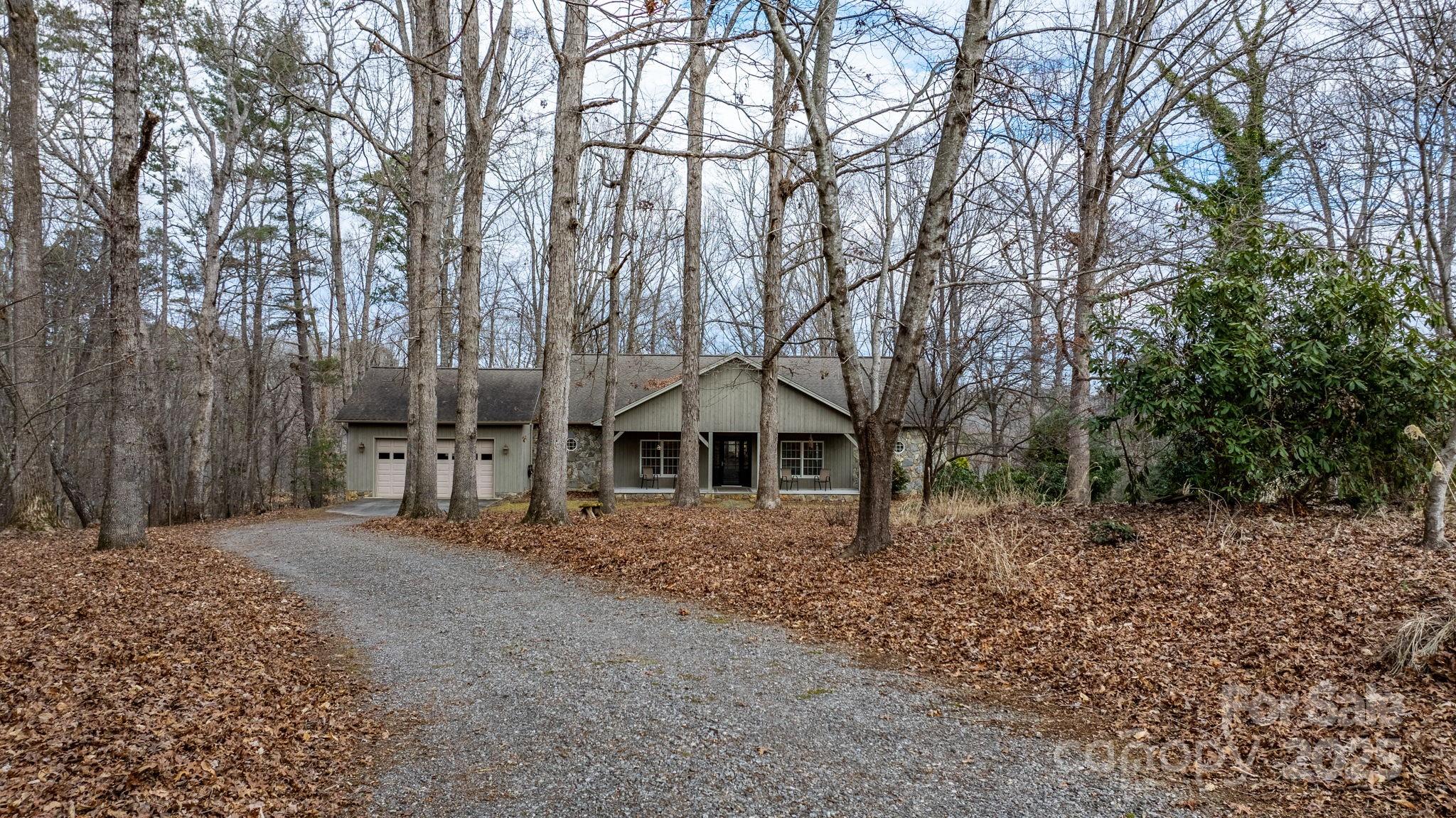 4530 Meandering Way Conover, NC 28613 - Photo 46 of 48 a front view of a house with large trees