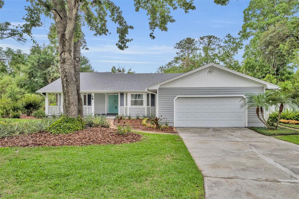 front view of a house with a yard