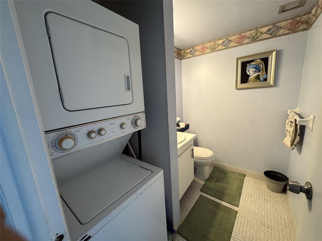 4174 Inverrary Drive, Unit 905 Lauderhill, FL 33319 - Photo 12 of 23 a bathroom with a toilet and a shower