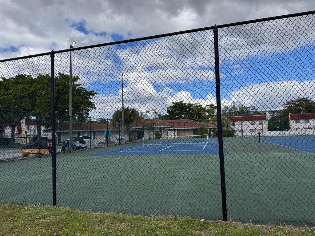 4174 Inverrary Drive, Unit 905 Lauderhill, FL 33319 - Photo 23 of 23 a view of a swimming pool and a yard