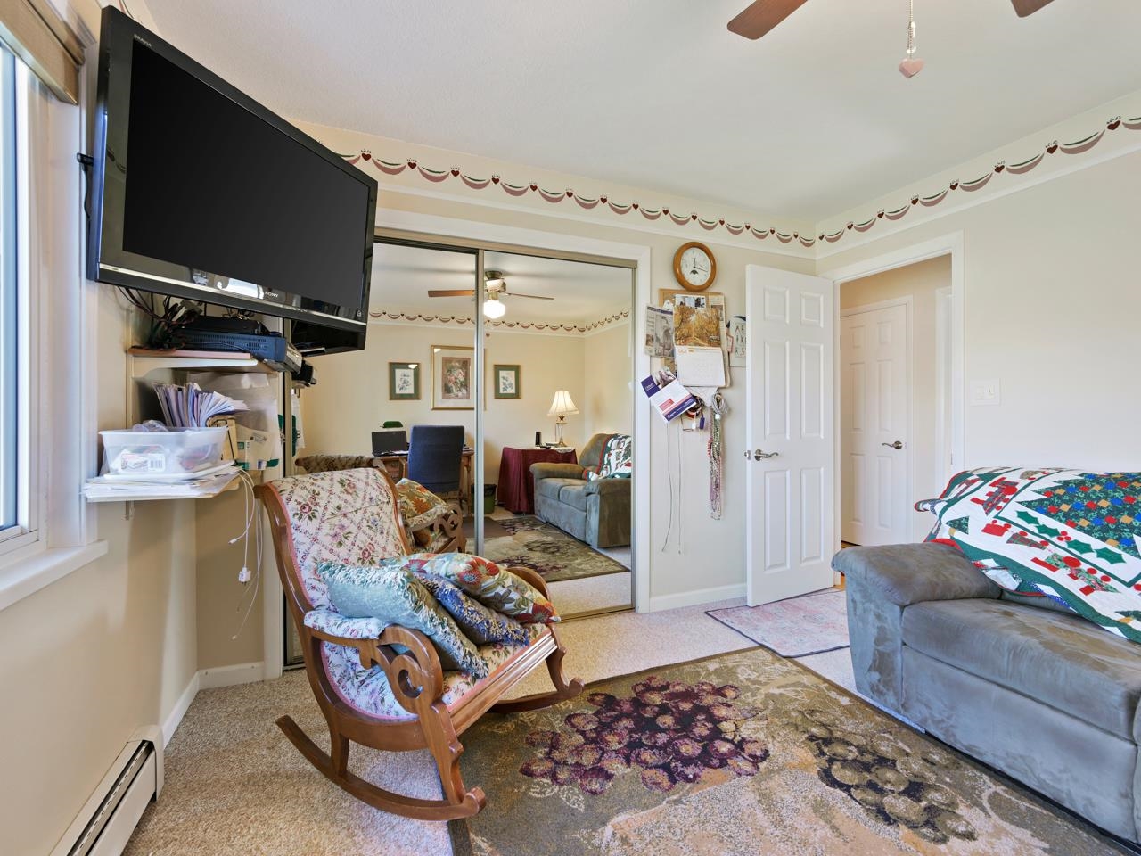 3697 F Road Palisade, CO 81526 - Photo 15 of 40 a living room with furniture and a flat screen tv