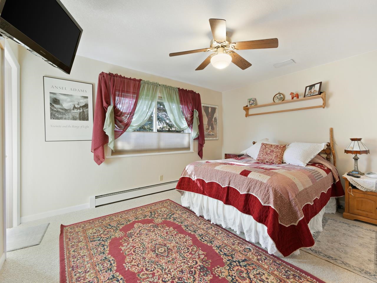 3697 F Road Palisade, CO 81526 - Photo 17 of 40 a bedroom with a bed and dresser