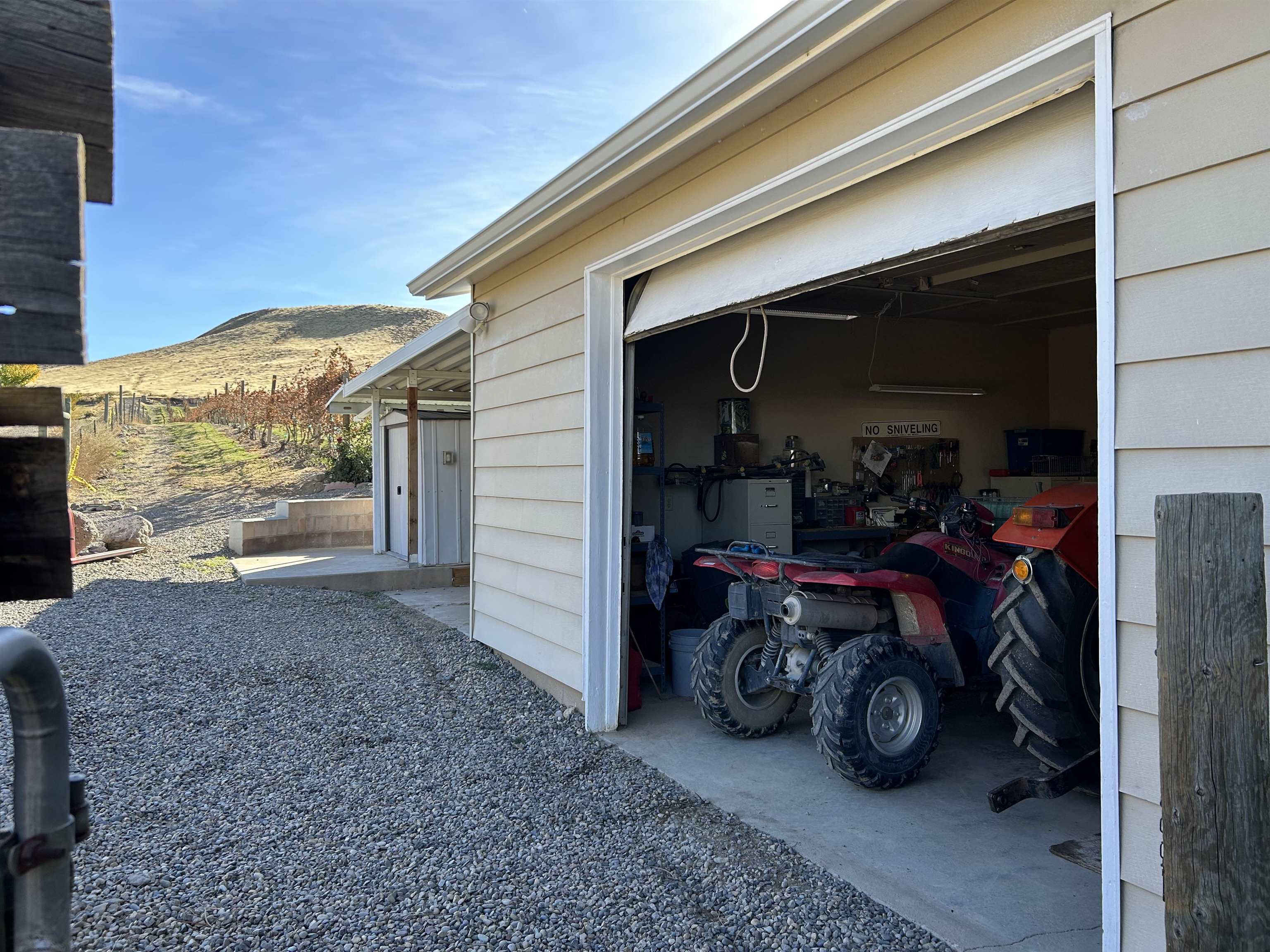 3697 F Road Palisade, CO 81526 - Photo 28 of 40 a view of a garage with parked cars