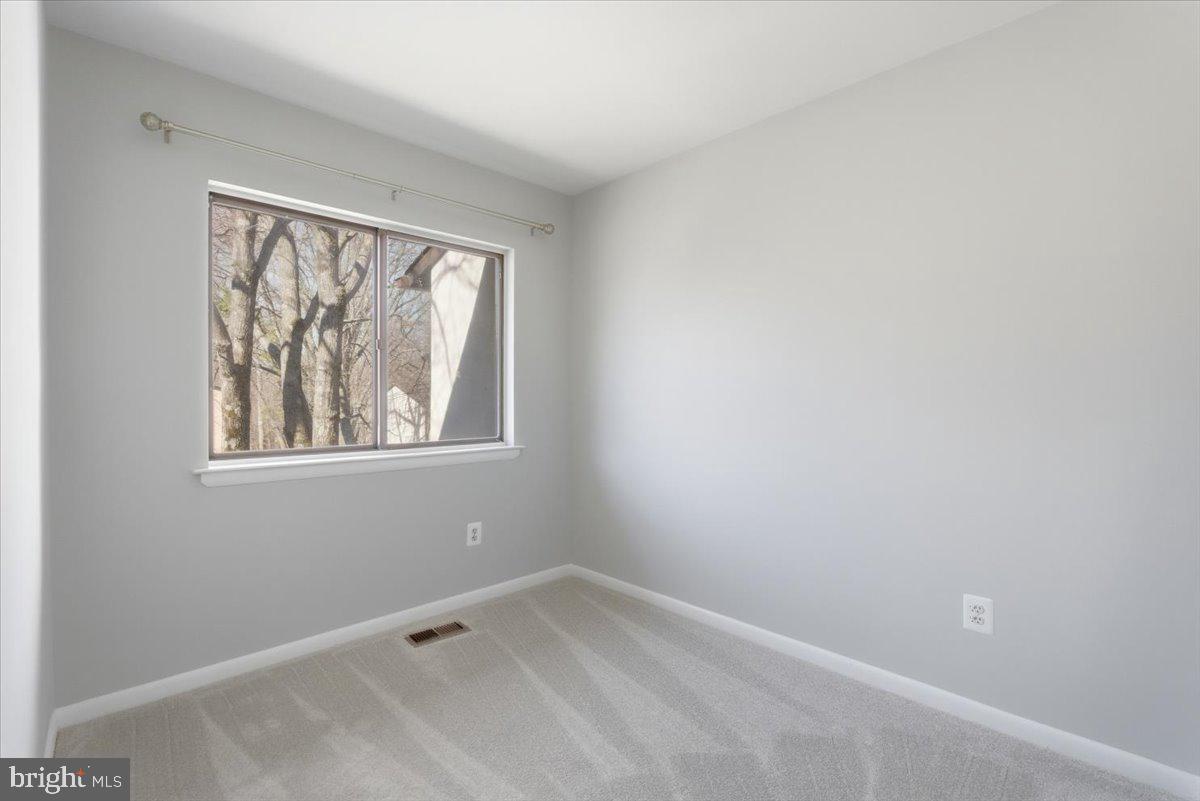 11919 Barrel Cooper Court Reston, VA 20191 - Photo 25 of 39 an empty room with a window
